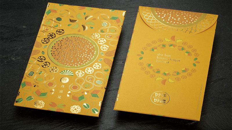 Phong bao lì xì Tết được in nhũ vàng, họa tiết hoa văn trở thành hình tượng văn hóa đẹp